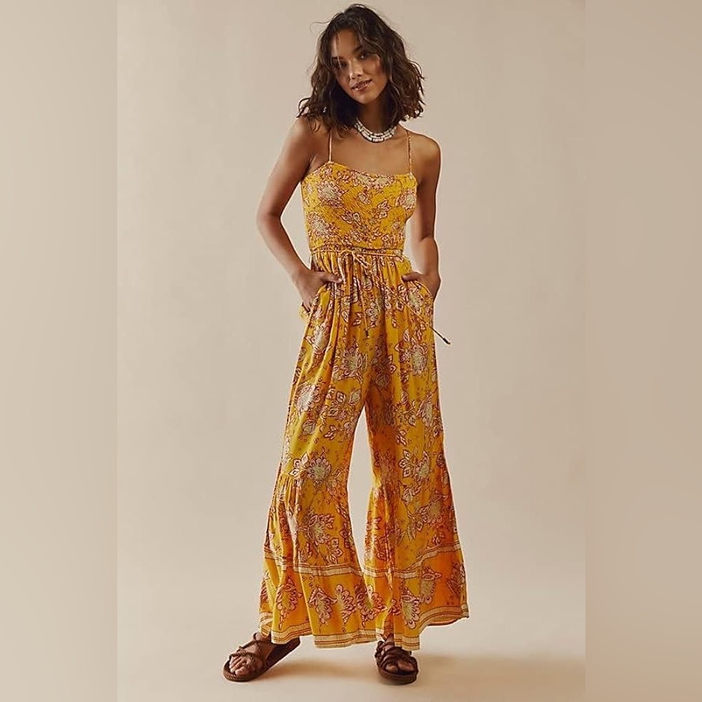 NWT FREE PEOPLE Little of your love jumpsuit in marigold combo. S